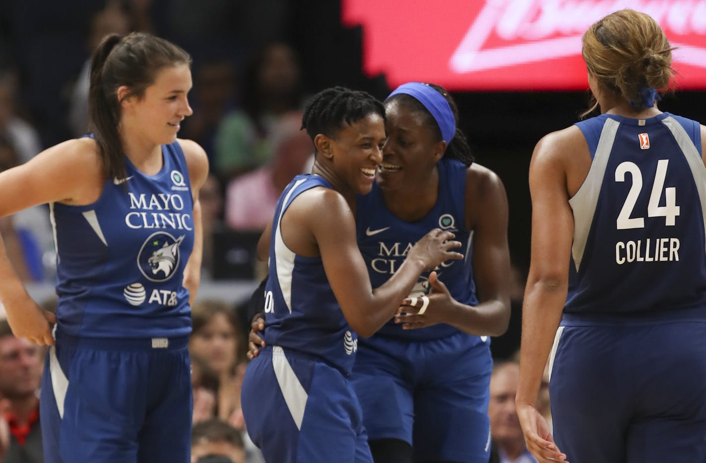 Danielle Robinson was congratulated by center Temi Fagbenle after she was fouled while making a shot during Sunday's victory against Las Vegas at Target Center.