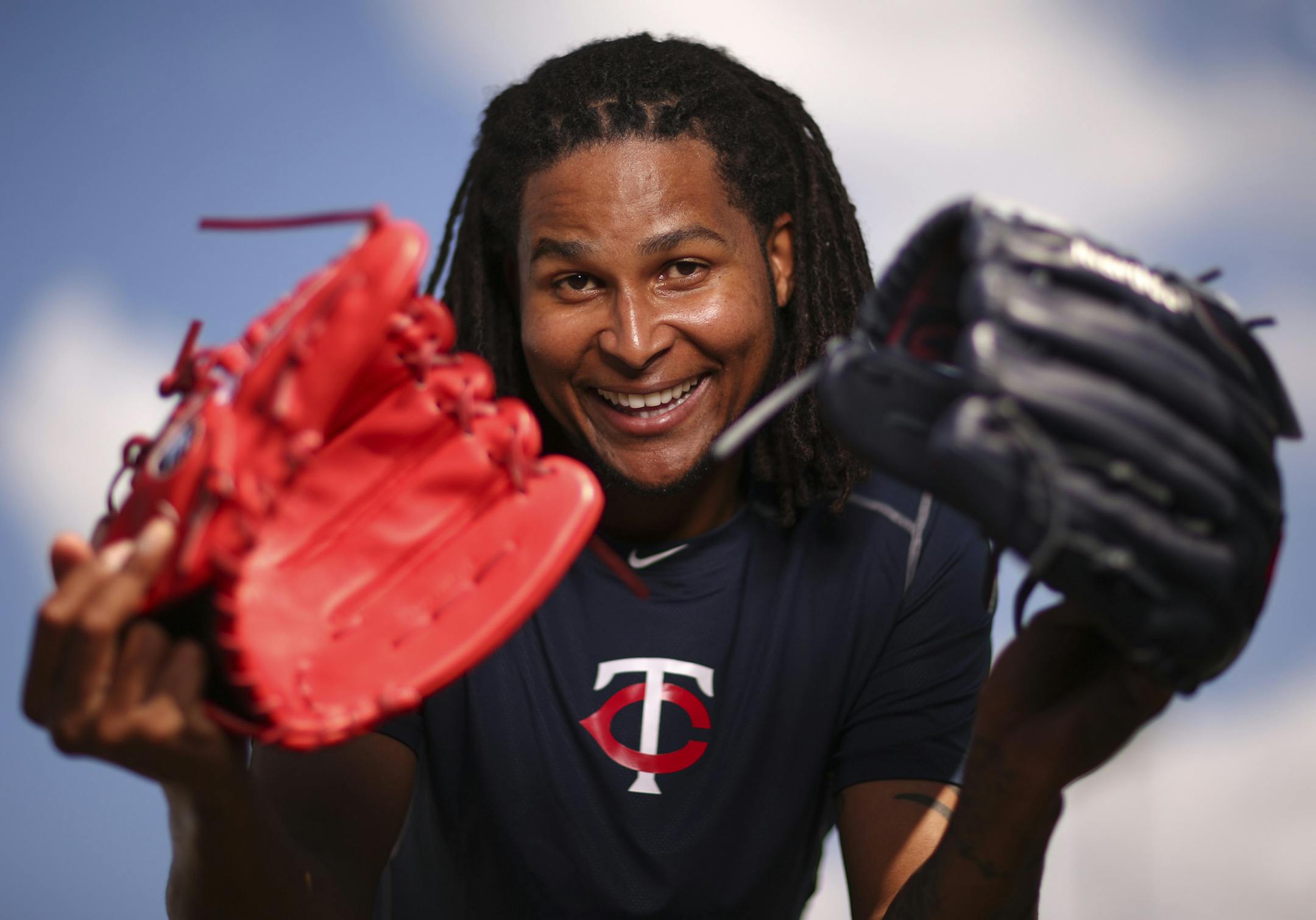 Twins pitcher Ervin Santana with two of his gloves Wednesday afternoon at Hammond Stadium in Fort Myers. ] JEFF WHEELER ï jeff.wheeler@startribune.com The Twins played their first exhibition baseball game against the University of Minnesota team Wednesday night, March 4, 2015, at Hammond Stadium in Fort Myers, FL.