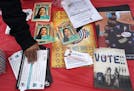 People picked up literature at an early voting celebration on Oct. 29, 2020, at the American Indian OIC in Minneapolis. Organizers helped boost Native