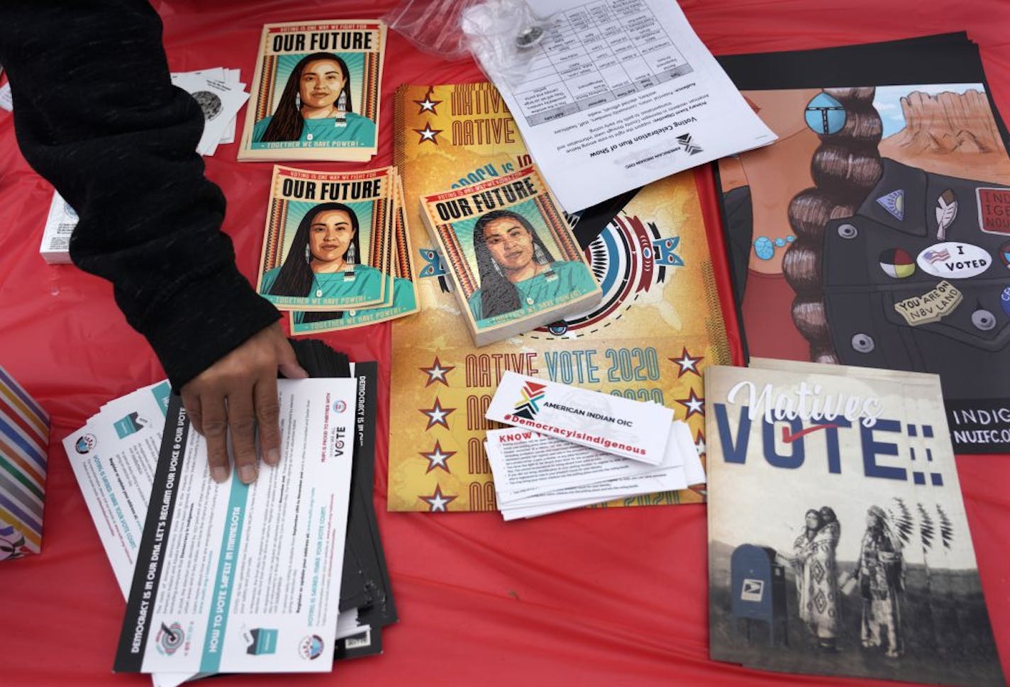 People picked up literature at an early voting celebration on Oct. 29, 2020, at the American Indian OIC in Minneapolis. Organizers helped boost Native turnout in the Twin Cities and at reservations in northern Minnesota this year's election.