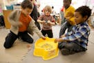 Children played with Beyblades in New York. The Minnesota Department of Commerce will ban certain knockoffs of the popular spinning battle toys.