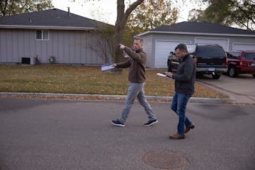 GOP House Minority Leader Kurt Daudt, left, campaigned with Republican Rep. John Heinrich in Anoka on Oct. 20. Heinrich faces DFL Rep. Zack Stephenson