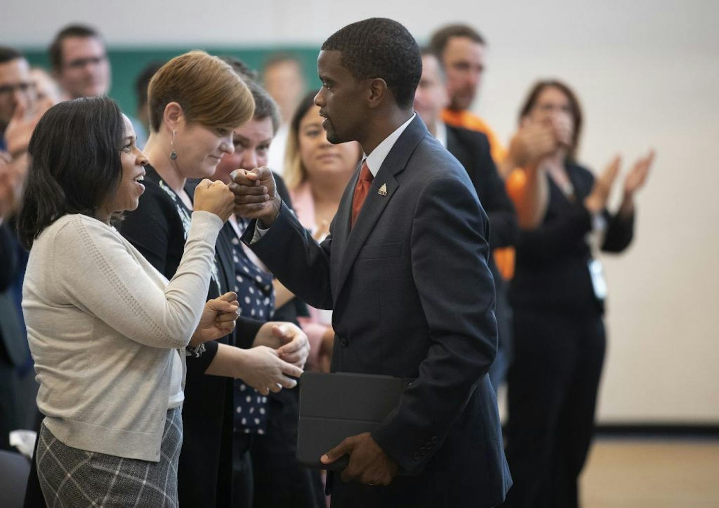 St. Paul Mayor Melvin Carter fistbumped his wife Sakeena after giving his 2020 budget address at Frogtown Community Center on Thursday.