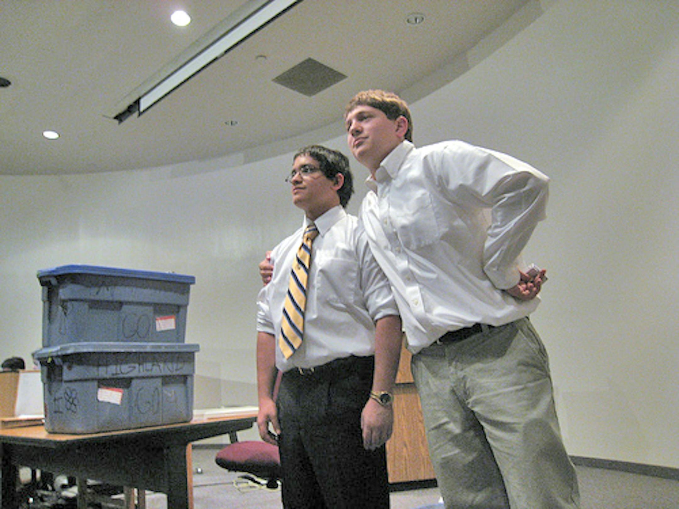 Juan Garcia, left, and Nat Olson are Team GO. The pair won every round of the state tournament. "They really are working hard and they're very skilled," said their coach, Sheila Peterson.