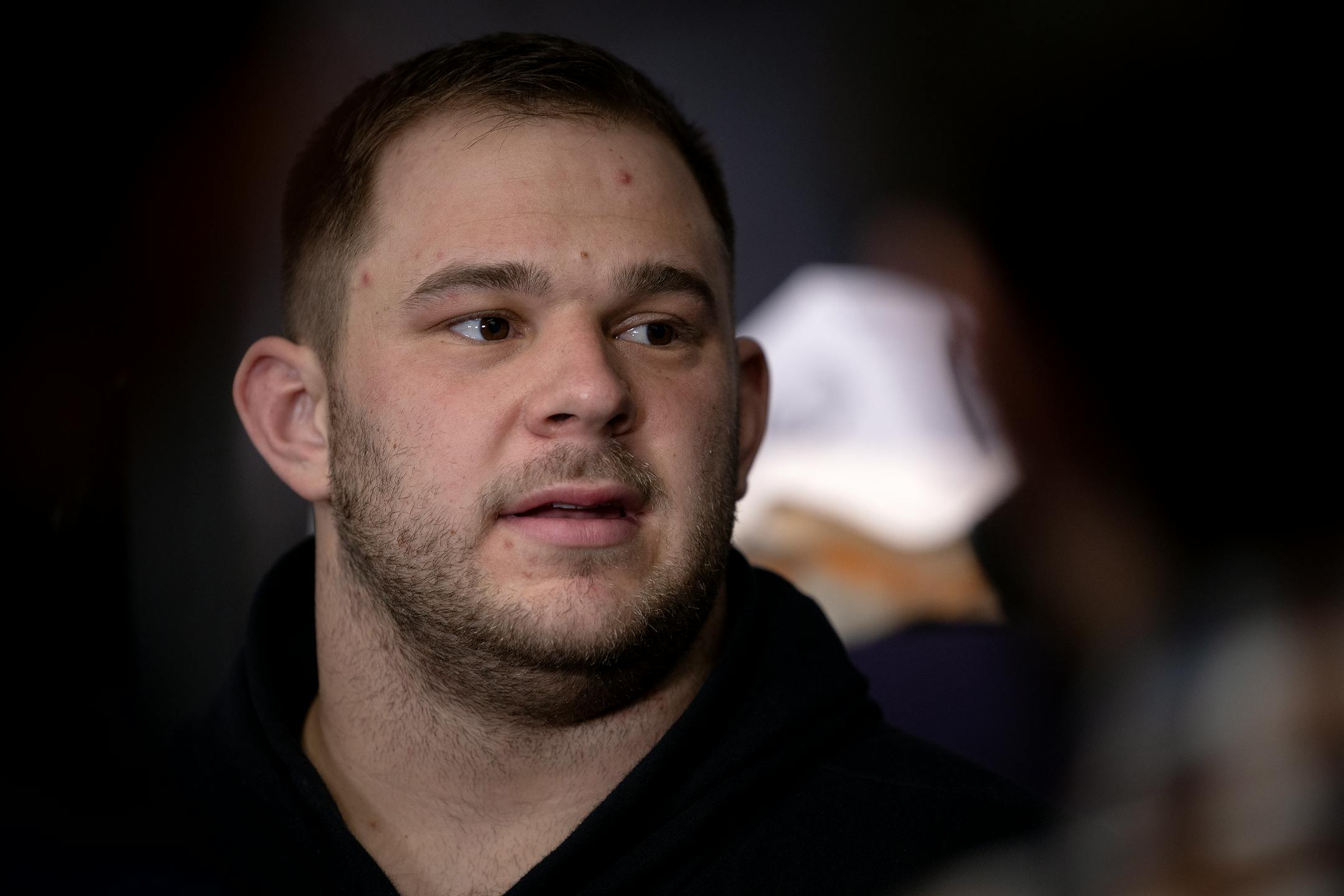 Minnesota Vikings center Garrett Bradbury (56) addresses the media in the locker room.