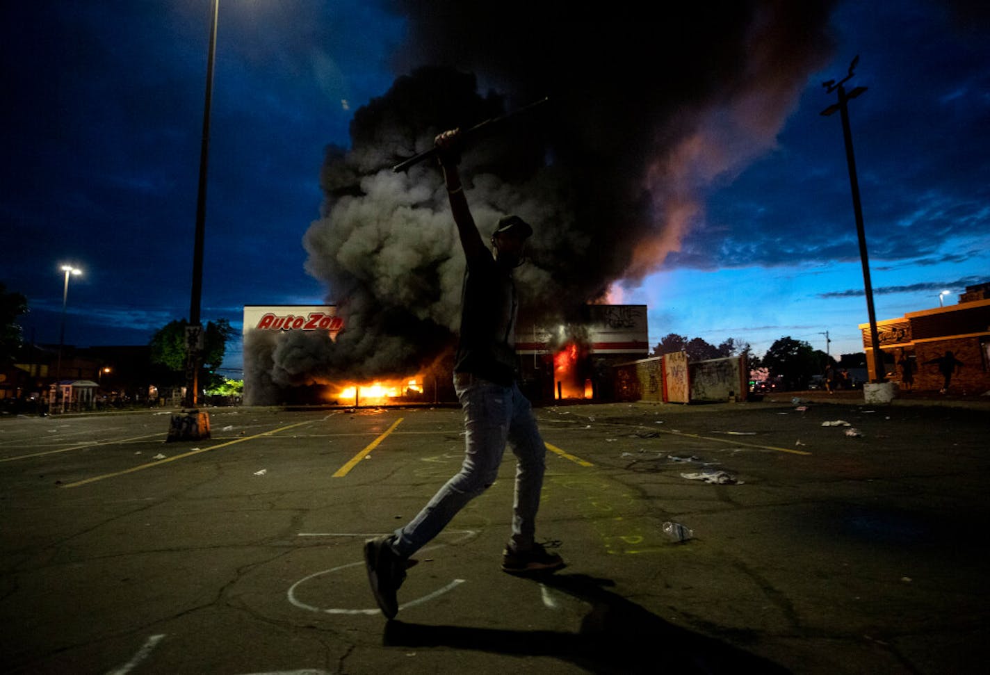 More than 1,500 buildings in Minnesota, including this AutoZone in Minneapolis, were damaged or destroyed during riots and looting after George Floyd's killing.