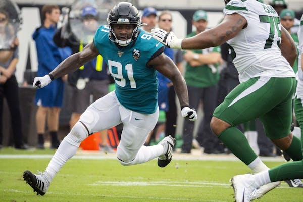 The Vikings swung an early-morning trade on Sunday with the Jaguars for defensive end Yannick Ngakoue, sending a 2021 second-round pick and a conditio