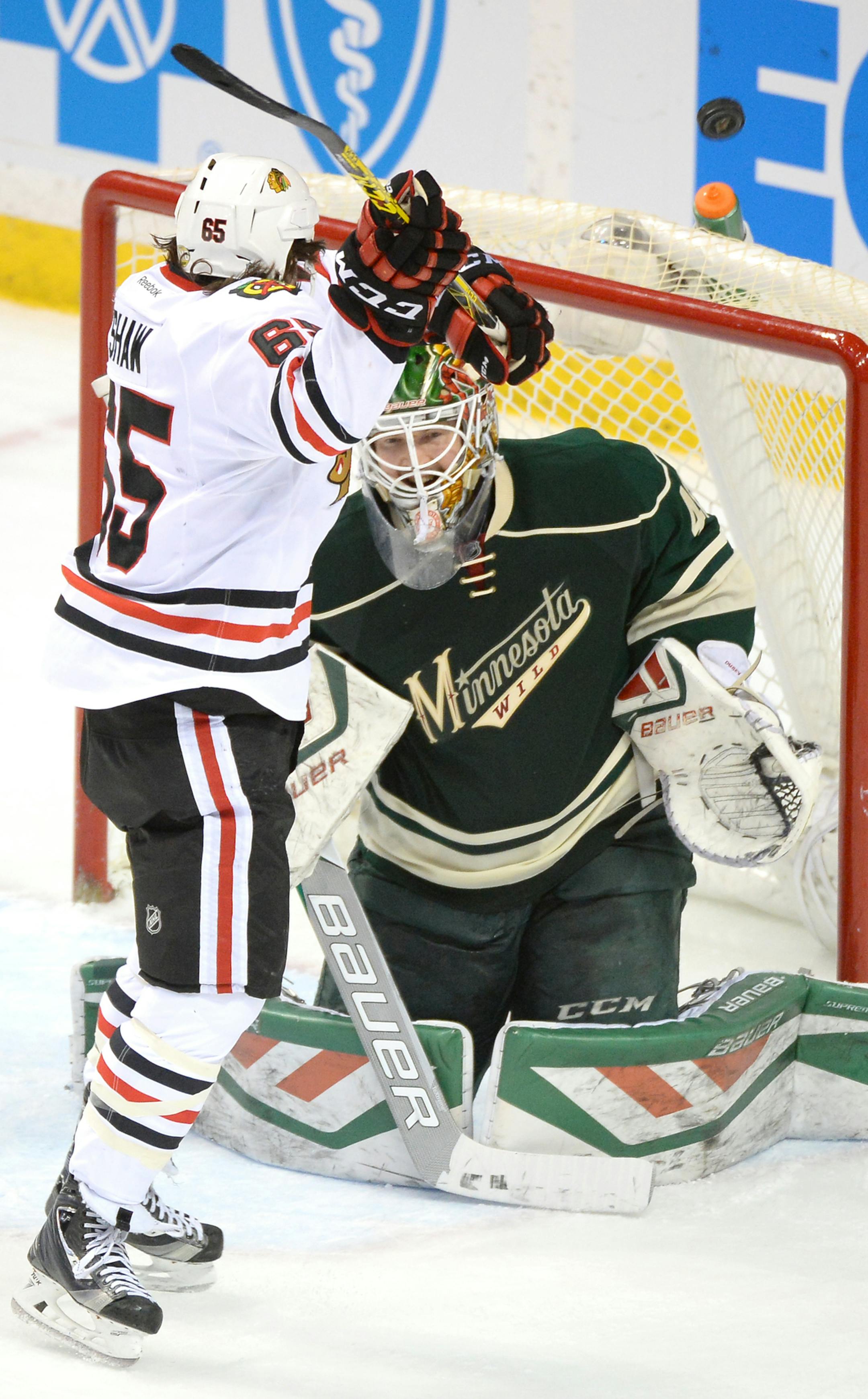 Chicago Blackhawks center Andrew Shaw (65) was unable to score on Minnesota Wild goalie Devan Dubnyk (40) during a second period power play. ] (AARON LAVINSKY/STAR TRIBUNE) aaron.lavinsky@startribune.com The Minnesota Wild played the Chicago Blackhawks on Tuesday, March 29, 2016 at Xcel Energy Center in St. Paul, Minn.