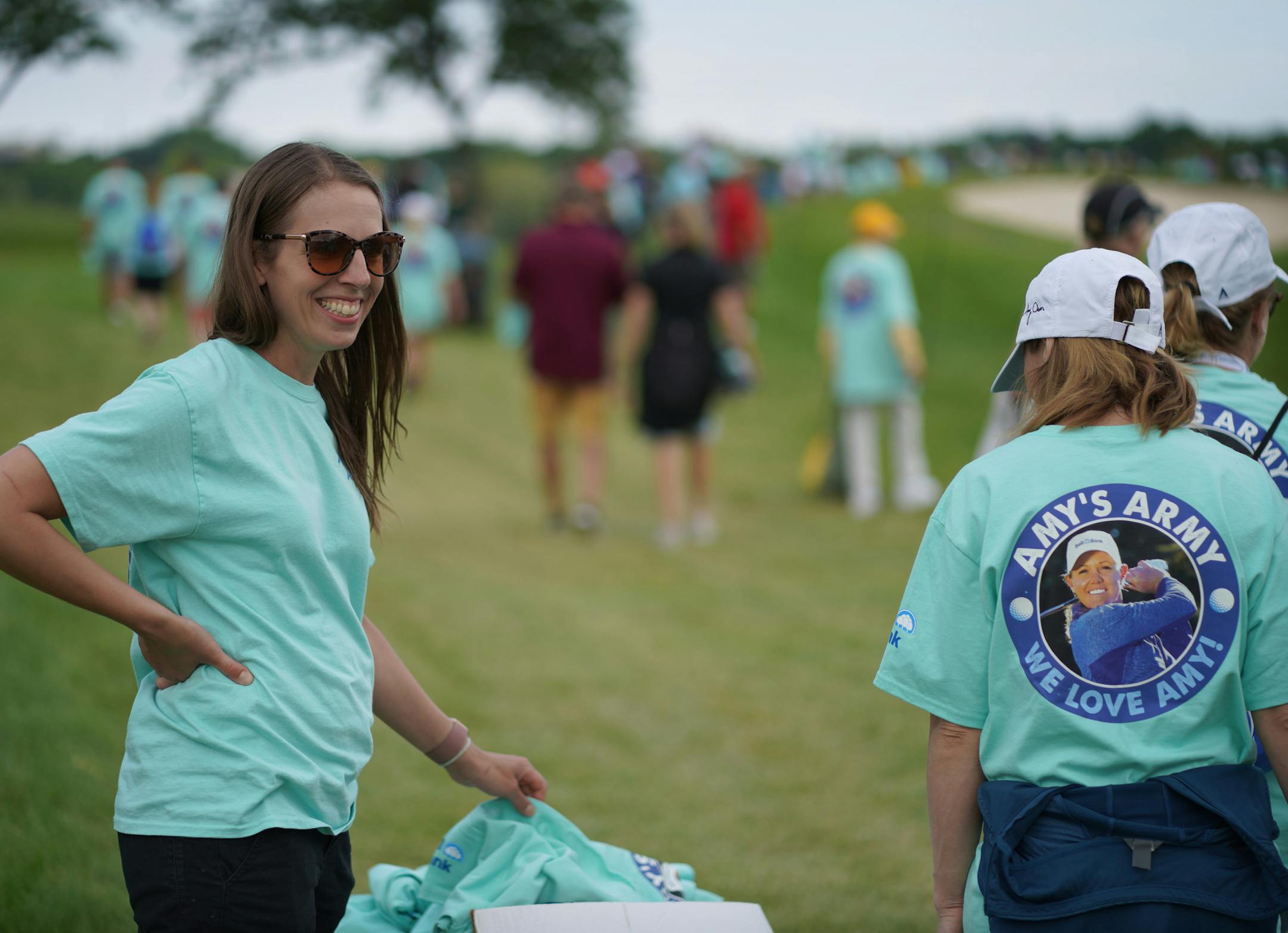 Julie Lovaas passed out tee shirts with Amy Olson photograph on at Hazeltine National Golf Club Thursday June 20, 2019 in Chaska, MN.] Olson is from Oxbow, ND. Jerry Holt • Jerry.holt@startribune.com I
