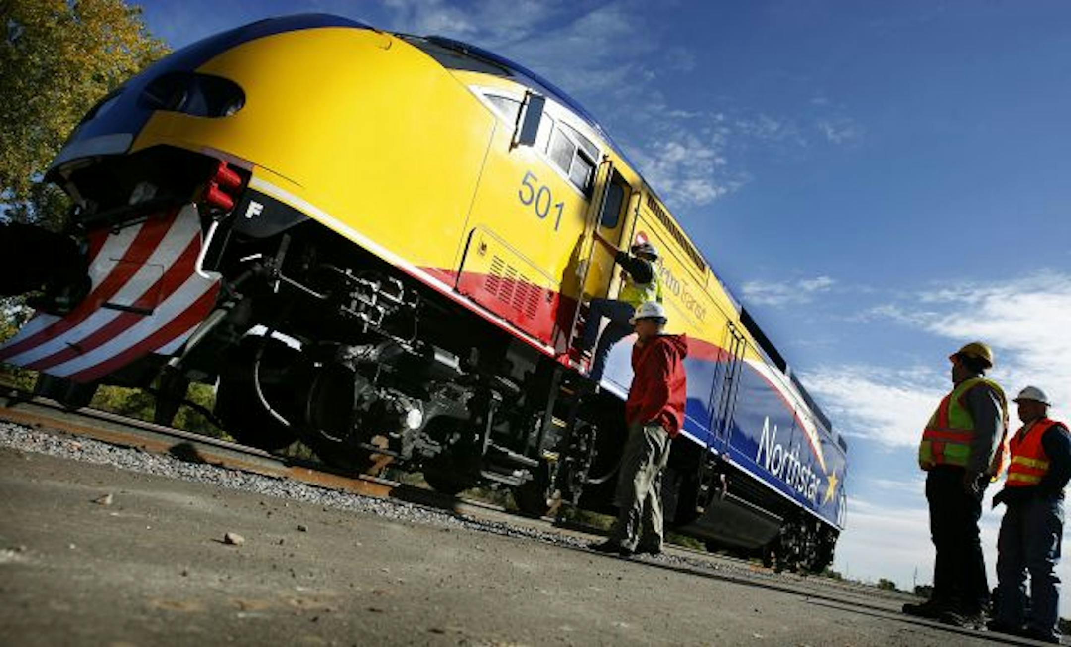 Visitors and media members got a chance to check out the first of five Northstar locomotives outside the Vehicle Maintenance Facility in Big Lake. The locomotive (no. 501) arrived at the facility on Oct. 3, passing future Northstar stations under construction in Minneapolis, Coon Rapids, Anoka, and Elk River. The locomotives are being manufactored by Motive Power, Inc. of Boise, ID. Traveling at top speeds of 79 miles per hour, the locomotives will move passengers along 40 miles of existing BNSF