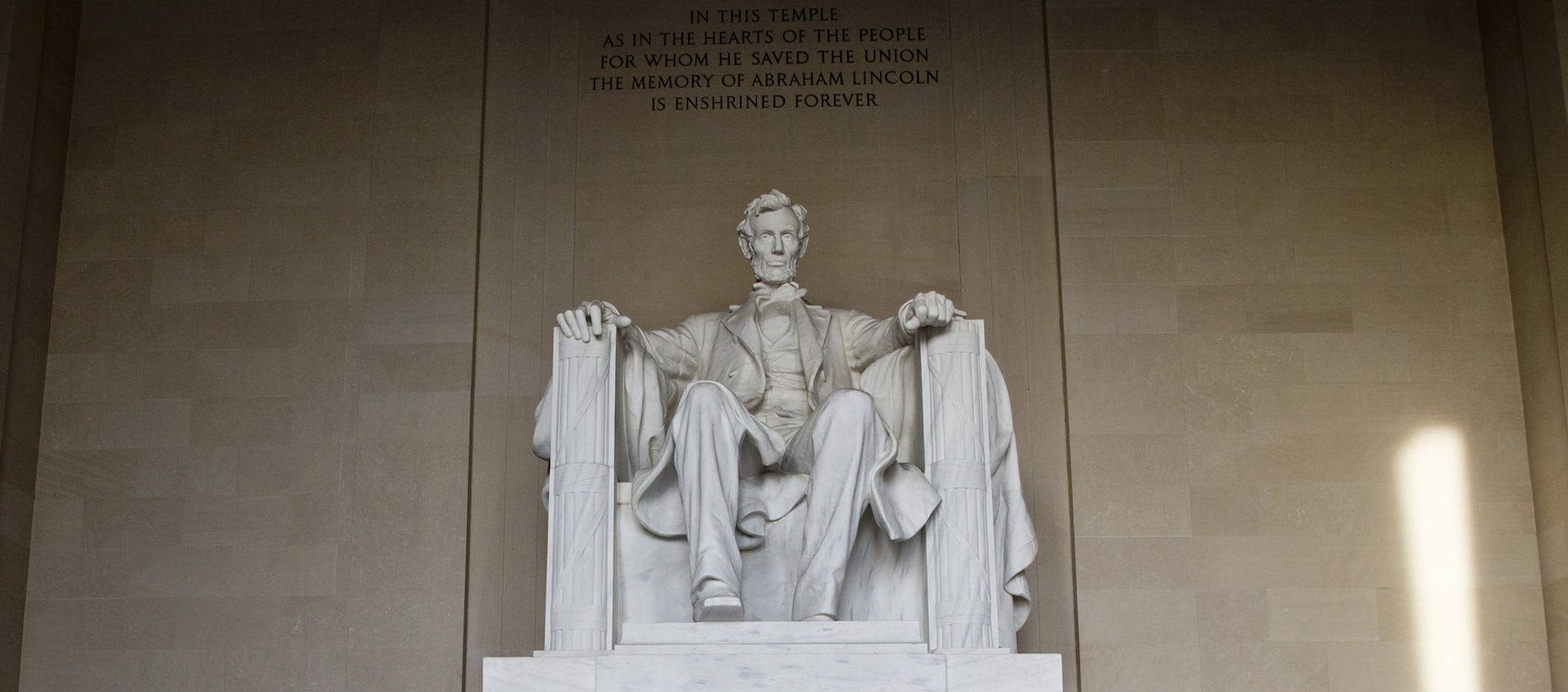 Ronald Price, with the U.S. Park Service, sweeps up after the U.S. military conducted a Presidential Full Honor Wreath-Laying Ceremony in celebration of the 207th birthday of President Abraham Lincoln, Friday, Feb. 12, 2016, at the Lincoln Memorial in Washington. (AP Photo/Alex Brandon)