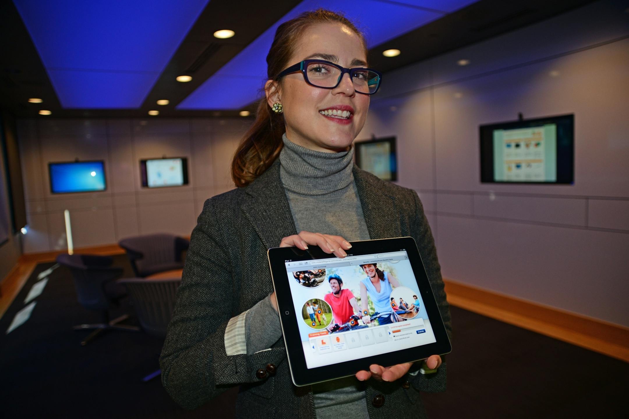 Arrianne Hoyland is developing videogames for health care applications as a Game Producer at UnitedHealth Group headquarters . Growing up when she wasn't painting she was playing video games and vice a versa. She was talking about the latest games, in the UnitedHealth's innovation lab.