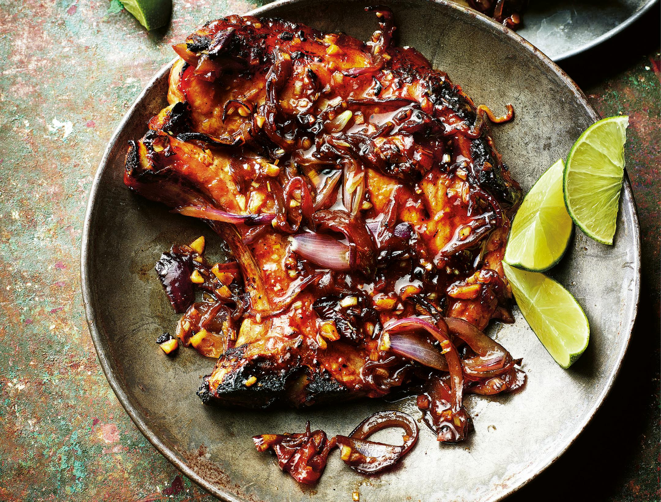 Charred and Saucy Pork Chops from "Jeremy Pang's School of Wok," by Jeremy Pang (Hamlyn, 2022). Credit: Kris Kirkham