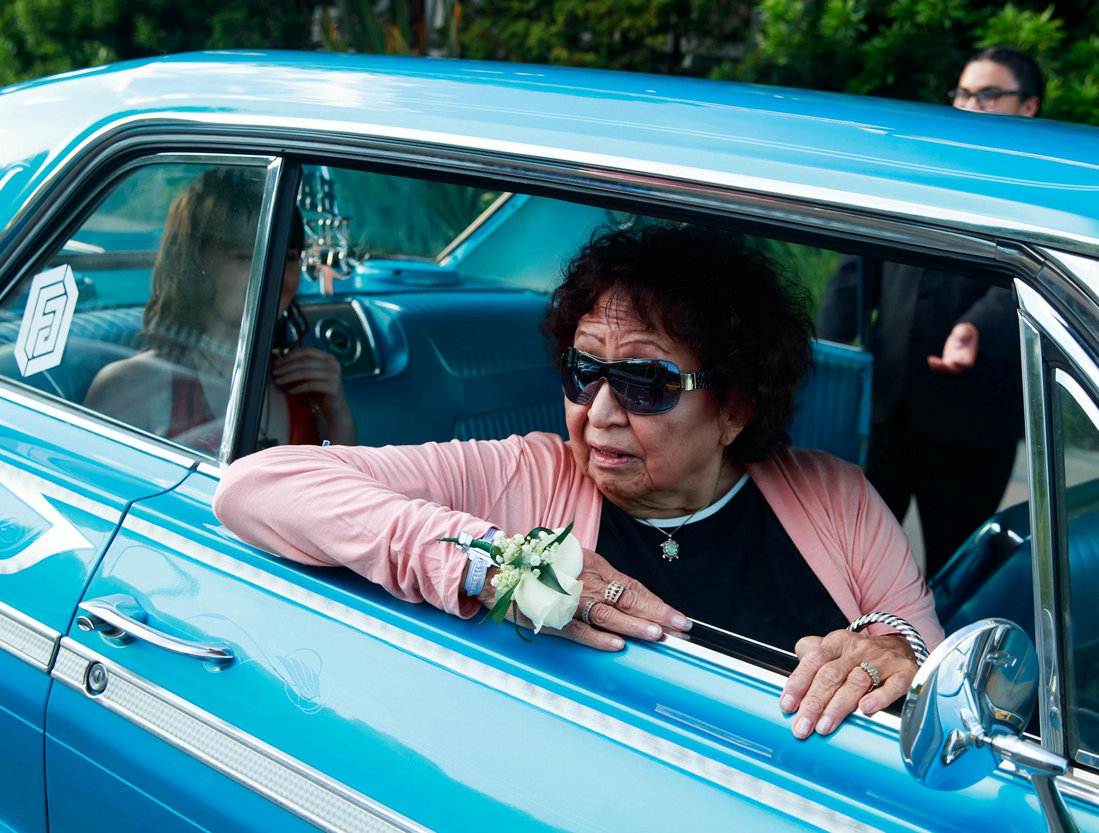 Great-grandmother Marie Antone, 74, looks out of 1964 Impala at Salty's restaurant in West Seattle on her way to prom. (Erika Schultz/Seattle Times/TNS)