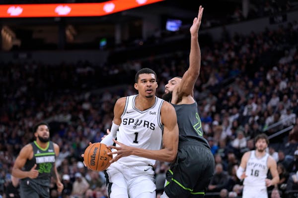 Spurs scare Wolves before losing 15th straight when Gobert takes over
