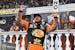 Martin Truex Jr. celebrated in Victory Lane after winning the NASCAR Cup race at Pocono Raceway on Sunday in Long Pond, Pa.