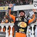 Martin Truex Jr. celebrated in Victory Lane after winning the NASCAR Cup race at Pocono Raceway on Sunday in Long Pond, Pa.