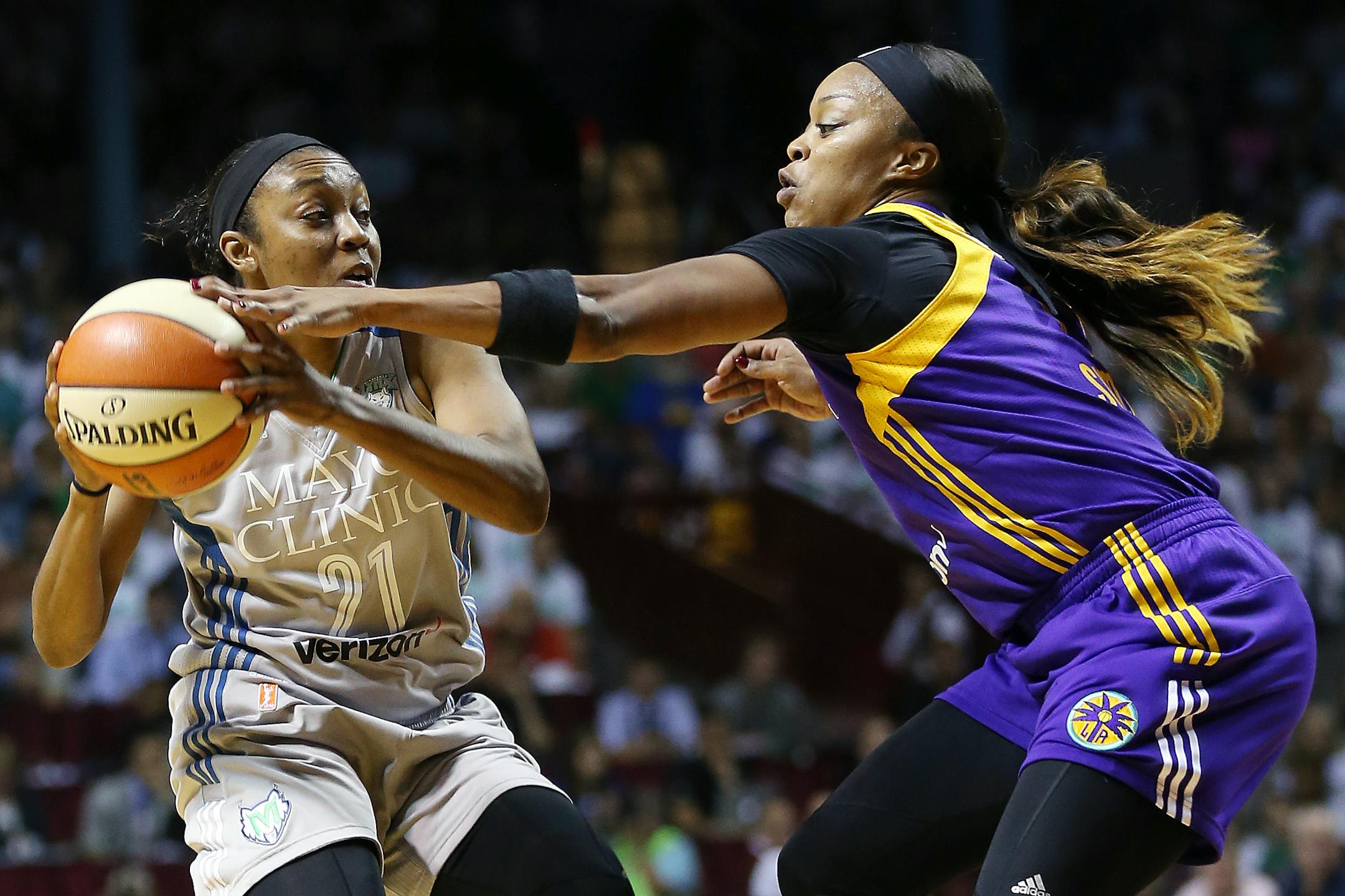 The Lynx acquired guard Odyssey Sims, right, from the Los Angeles Sparks on Monday in a trade for guard Alexis Jones. Sims should vie for major minutes as the Lynx revamp their roster.