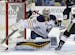 Buffalo Sabres goalie Ryan Miller (30) makes the save on a shot by Pittsburgh Penguins' Brian Gibbons (49) in the second period of an NHL hockey game 