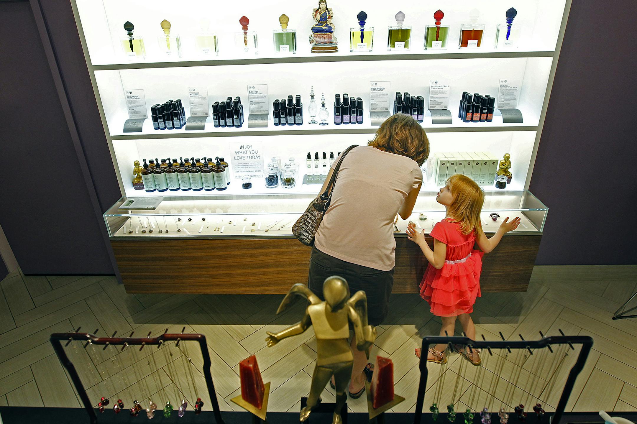 Nikki Eiden and her daughter Amoree, 5, tested fragrances at Intelligent Nutrients at the Mall of America.