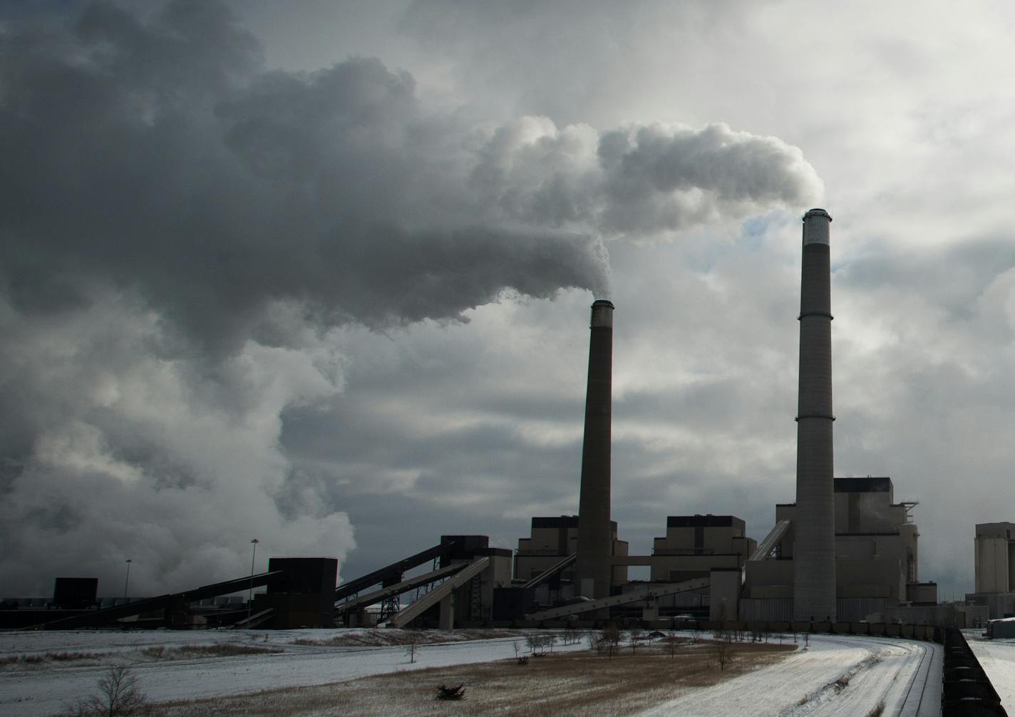 A coal train is idle on the tracks leading to the Sherburne County Generating Station on Wednesday afternoon in Becker. ] AARON LAVINSKY &#x2022; aaron.lavinsky@startribune.com Minnesota power companies have shuttered four smaller power plants and warn that supplies of coal to some of the largest, most important plants are dwindling as BNSF Railway's rail delivery problems persist. Photographs taken at Sherburne County Generating Station on Wednesday, Nov. 12, 2014 in Becker.