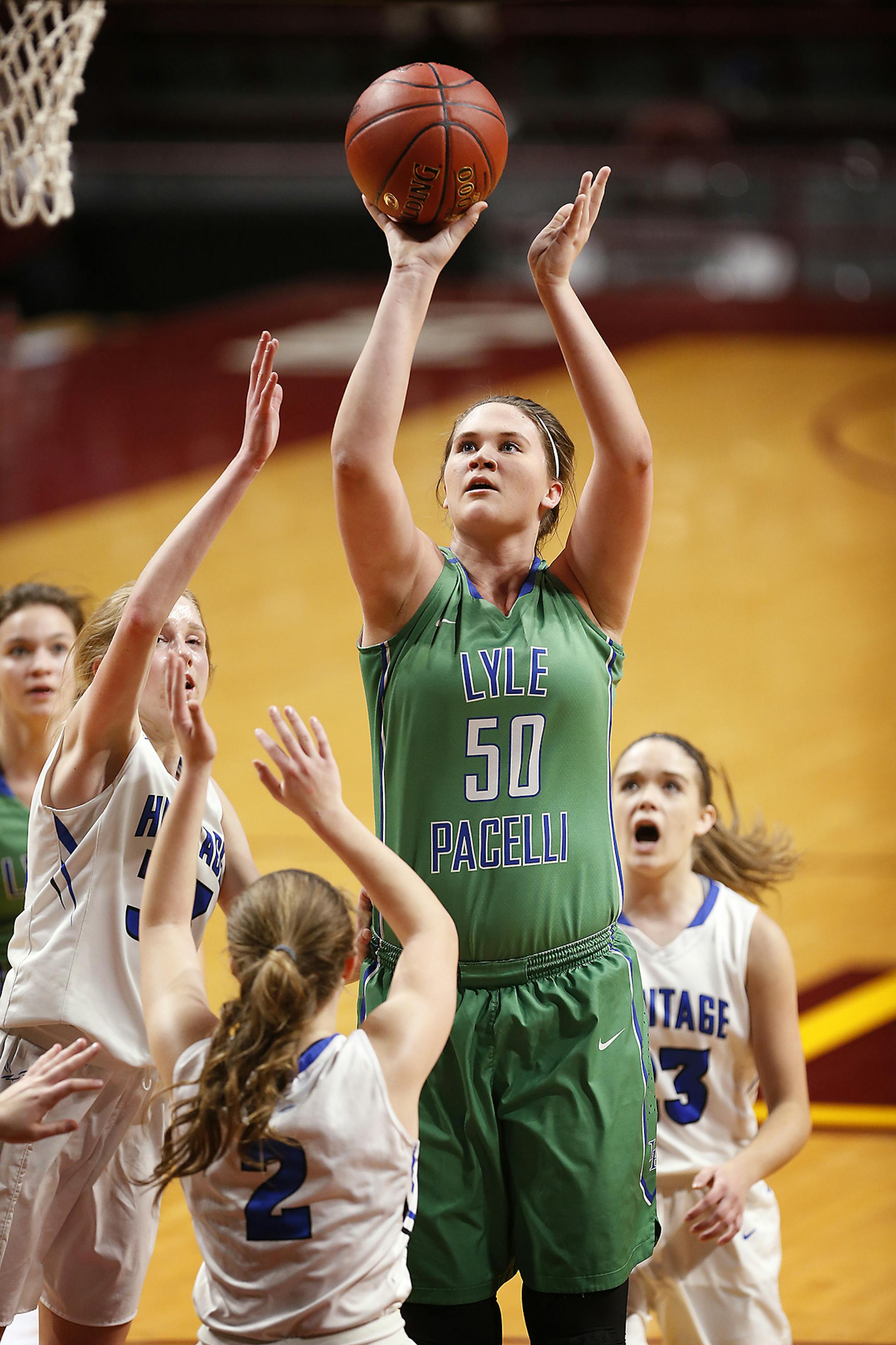 Lyle-Pacelli center Kristi Fett (50) shoots during the first half. ] LEILA NAVIDI ï leila.navidi@startribune.com BACKGROUND INFORMATION: Heritage Christian Academy plays against Lyle-Pacelli in the class 1A quarterfinals of the girls state basketball tournament at Williams Arena in Minneapolis on Thursday, March 15, 2018.