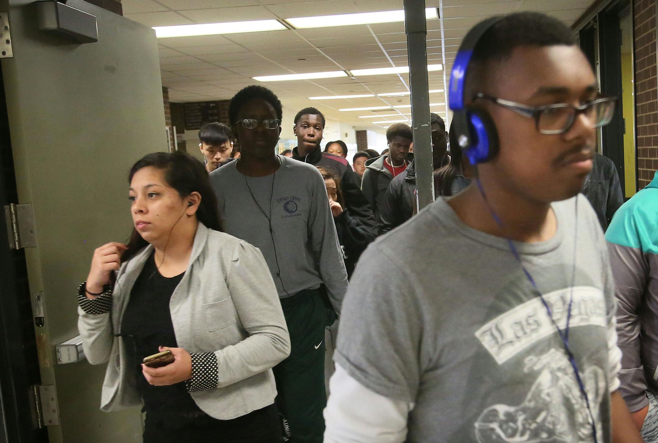Students at Park Center High move between classes Tuesday, May 19, 2015, in Brooklyn Park, MN.](DAVID JOLES/STARTRIBUNE)djoles@startribune.com In a state were students of color consistently lag behind white students, one high school has closed the gap when it comes to one critical measure: graduation rates. Park Center High in Brooklyn Park now graduates students of color at nearly the same rate as white students.