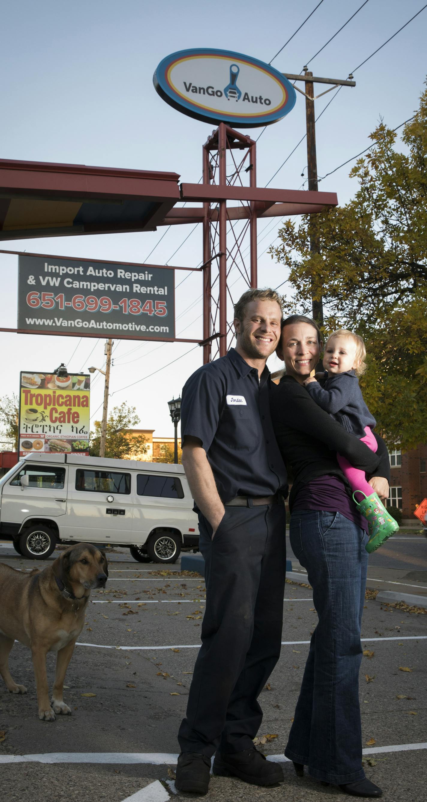 Jordan and Crystal Frank-Shannon and their daughter Ivy (and their dog Ron) posed for a photo at their three month old business VanGo Auto that is an auto repair shop and VW Campervan rental business on West Seventh Street in St. Paul, Minn., on Thursday, October 12, 2017. They are concerned the construction of the proposed streetcar along Seventh Street would negatively effect their new business. ] RENEE JONES SCHNEIDER &#x2022; renee.jones@startribune.com