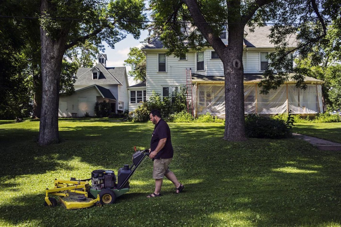 Jim Lohmann of Lake Elmo bought his house from his great uncle. His dad grew up here. He also had a sign stating "council is tyranny of majority." The small village's image contrasts greatly with the sprawling city of Woodbury.