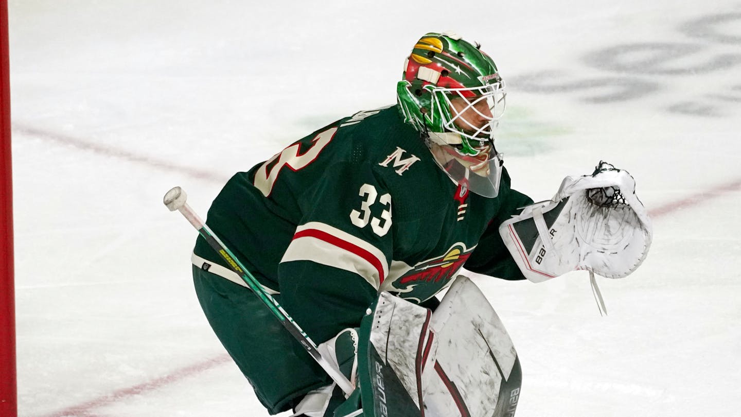 Minnesota Wild goalie Cam Talbot (33) defends the net in an NHL hockey game, Wednesday, March 16, 2022, in St. Paul, Minn. (AP Photo/Jim Mone)