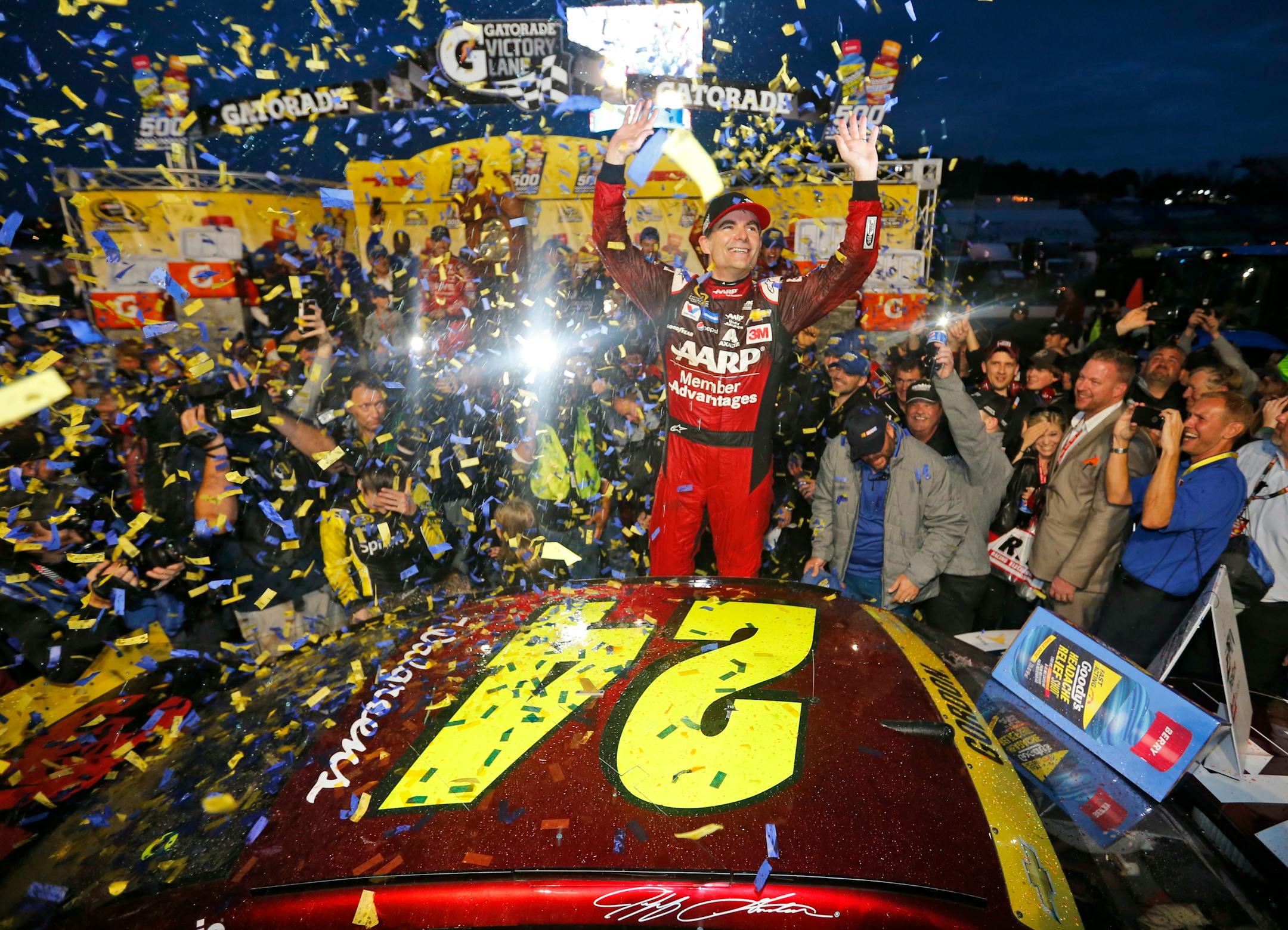 Jeff Gordon celebrates after winning the NASCAR Sprint Cup Series auto race at Martinsville Speedway in Martinsville, Va., Sunday, Nov. 1, 2015. (AP Photo/Steve Helber)