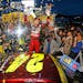 Jeff Gordon celebrates after winning the NASCAR Sprint Cup Series auto race at Martinsville Speedway in Martinsville, Va., Sunday, Nov. 1, 2015. (AP P