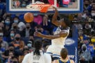 Timberwolves forward Anthony Edwards dunks against the Golden State Warriors during the second half