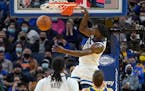Timberwolves forward Anthony Edwards dunks against the Golden State Warriors during the second half