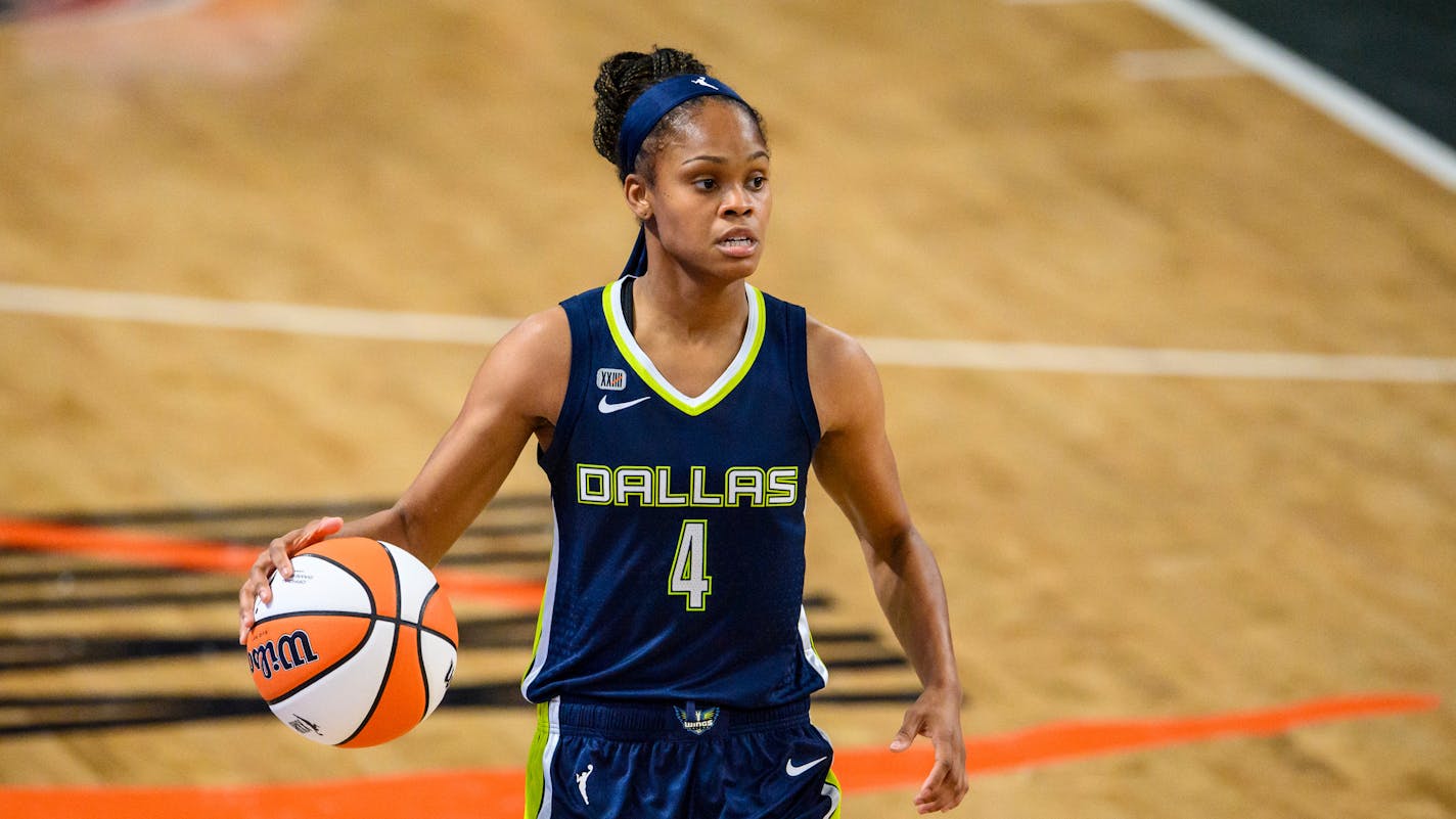 Dallas Wings guard Moriah Jefferson (4) in action during a WNBA basketball game against the Atlanta Dream, Thursday, May 27, 2021, in College Park, Ga. (AP Photo/Danny Karnik)