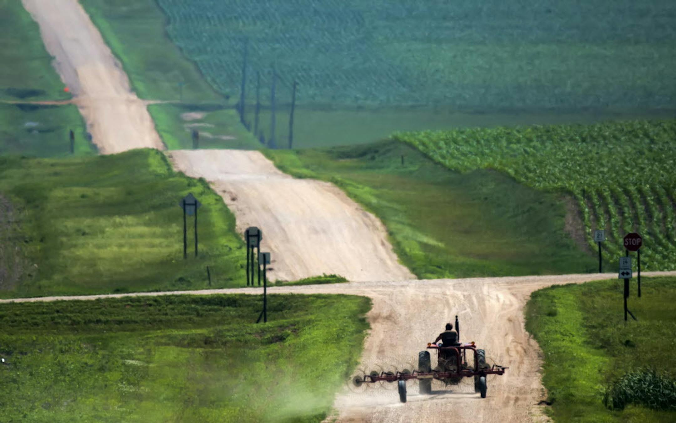 The Minnesota landscape of the South West that was predominately tall grass prairie before settlement is now a patchwork of farm fields and rolling dirt roads. ] Minnesota State of Wonders - Summer on the Prairie. BRIAN PETERSON &#x2022; brian.peterson@startribune.com Luverne, MN 08/02/14