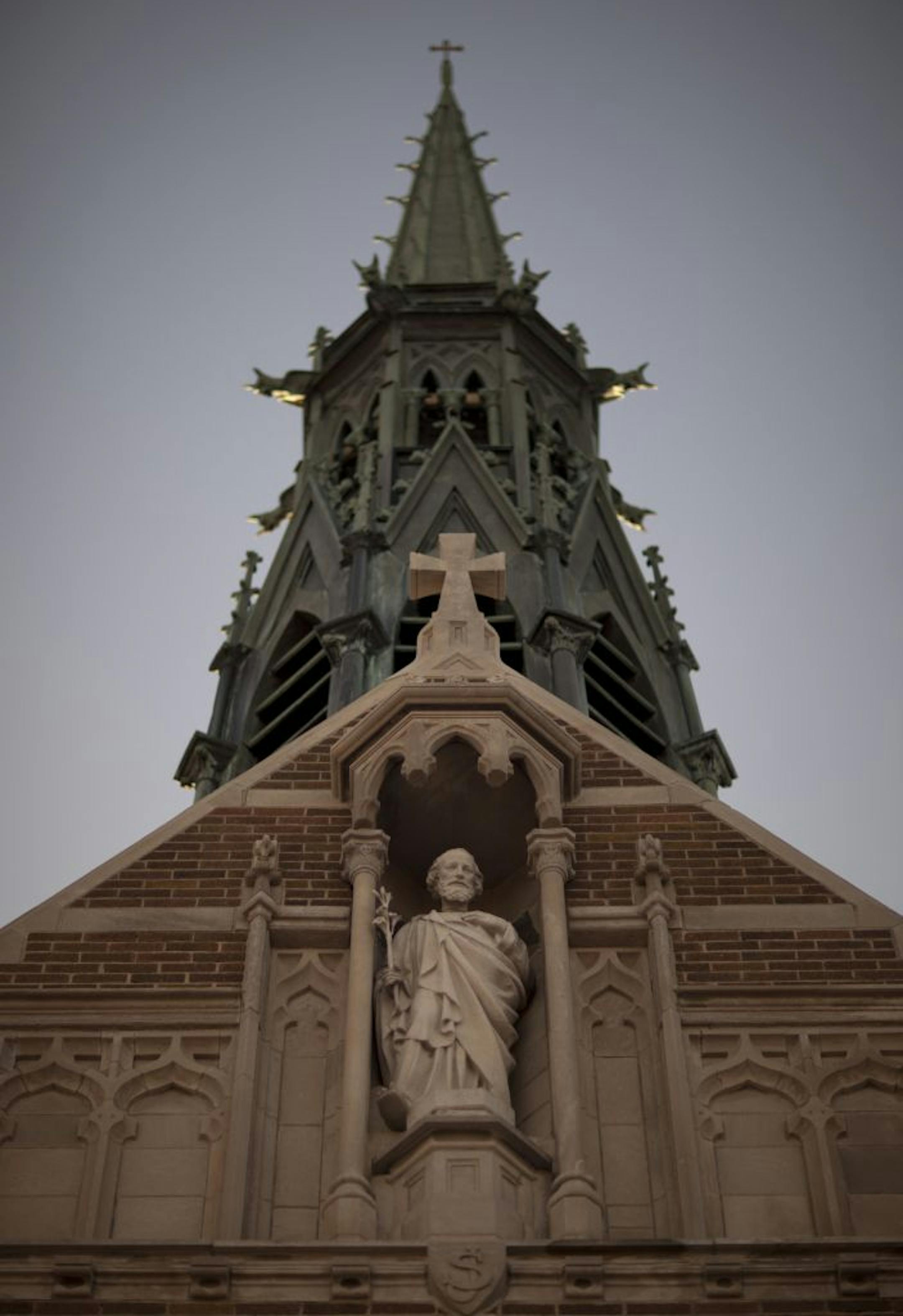 Detail of a statue of St. Joseph and the steeple from which the Steeple Center in Rosemount takes its name. The former catholic church became an event center last year.