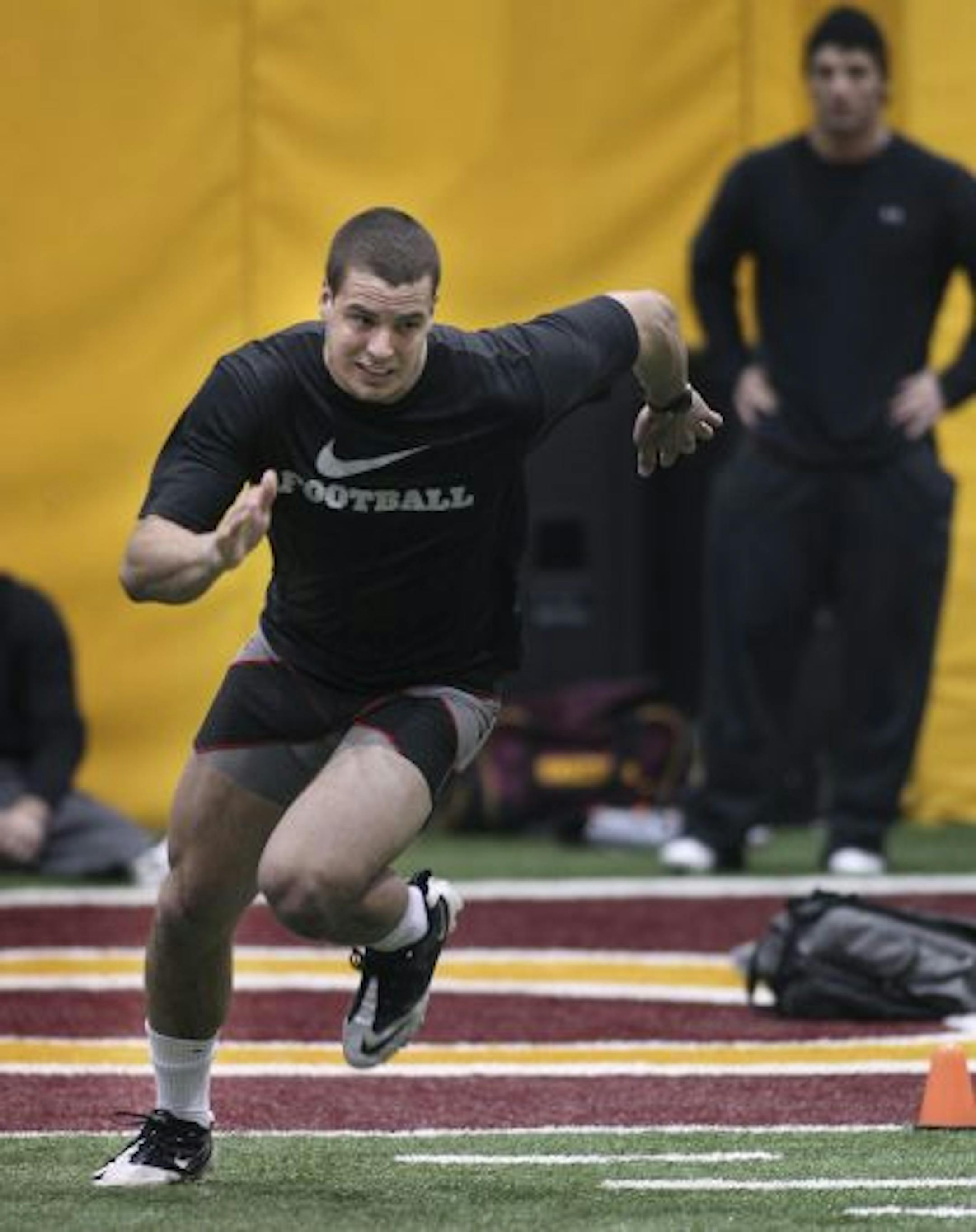 Dereck Domino went through drills during NFL tryouts at the University of Minnesota.