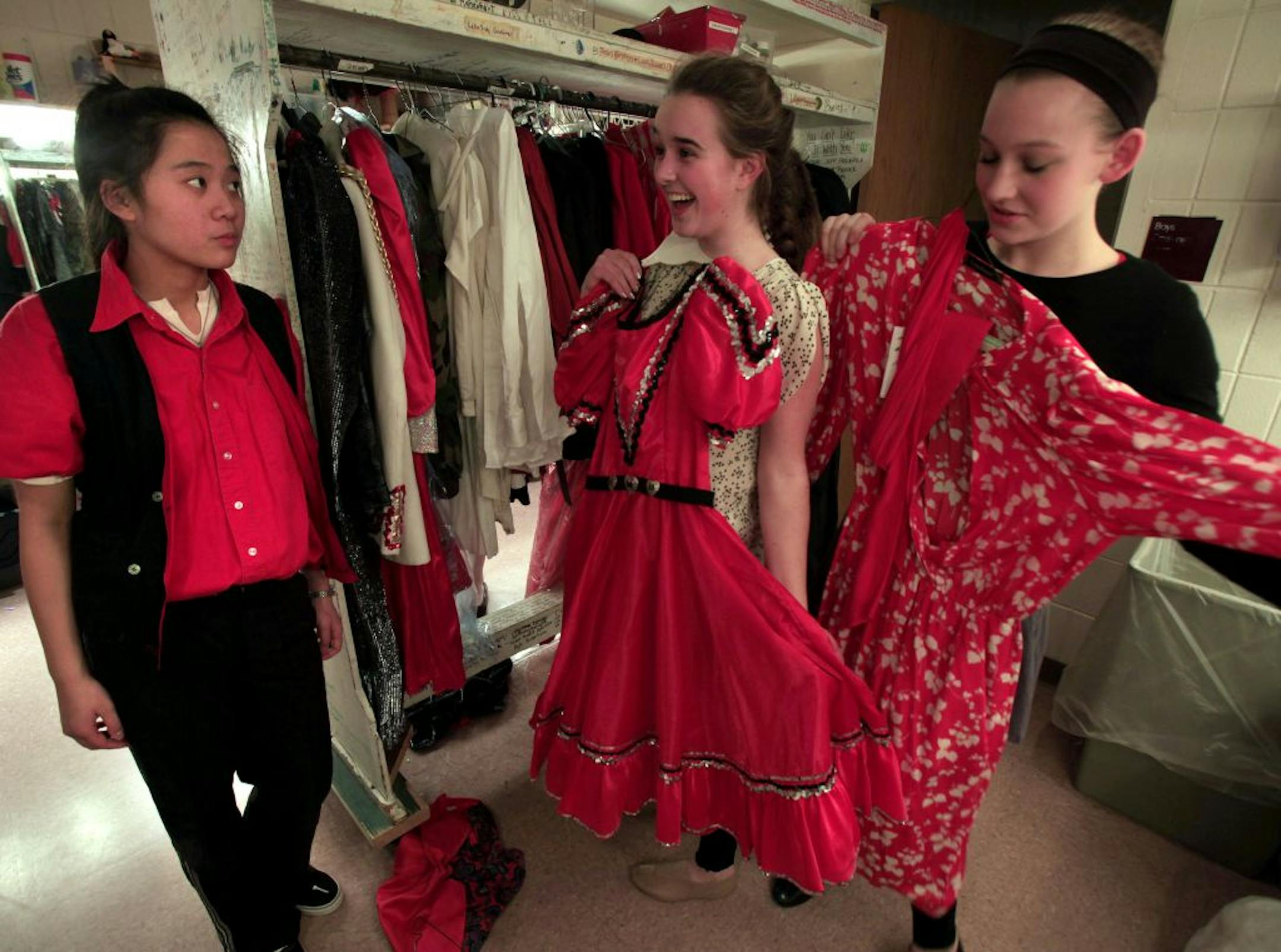 Actors get dressed for their rehersal at Visitation High School who are putting on a play at school in conjunction with Interact Center for the Arts, a theater company that helps disabled people perform. Mendota Heights, MN on January 30, 2013.