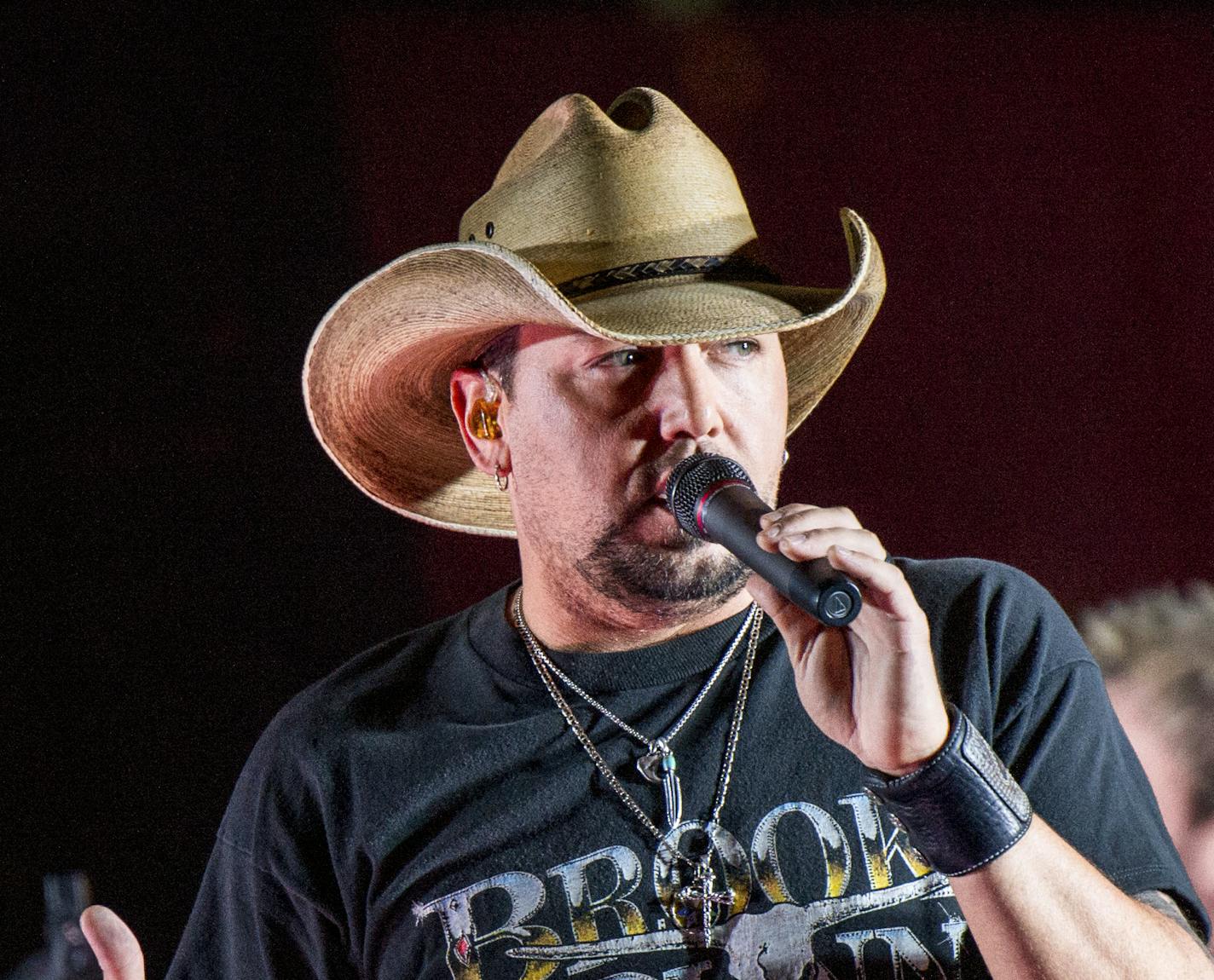 FILE - In this June 7, 2017 file photo Jason Aldean performs during a surprise pop up concert at the Music City Center in Nashville, Tenn. &#x201c;Saturday Night Live&#x201d; has paid tribute to the victims of the Las Vegas mass shooting and the late rock superstar Tom Petty by opening its show with country star Aldean singing one of Petty&#x2019;s songs. Aldean was performing at an outdoor concert in Las Vegas on Sunday, Oct. 1, 2017, when a gunman sprayed bullets into the crowd from a high-ris