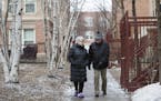 Jan and Art Larson walk through the courtyard while giving a tour of their downtown Minneapolis condo. ] LEILA NAVIDI &#xef; leila.navidi@startribune.