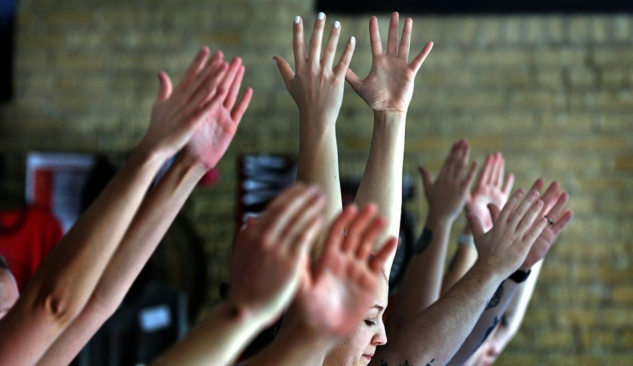 People participated in a yoga class at the Tin Whiskers Brewing Company in St. Paul. Following the class, many then enjoyed tasting the beer available at the establishment.