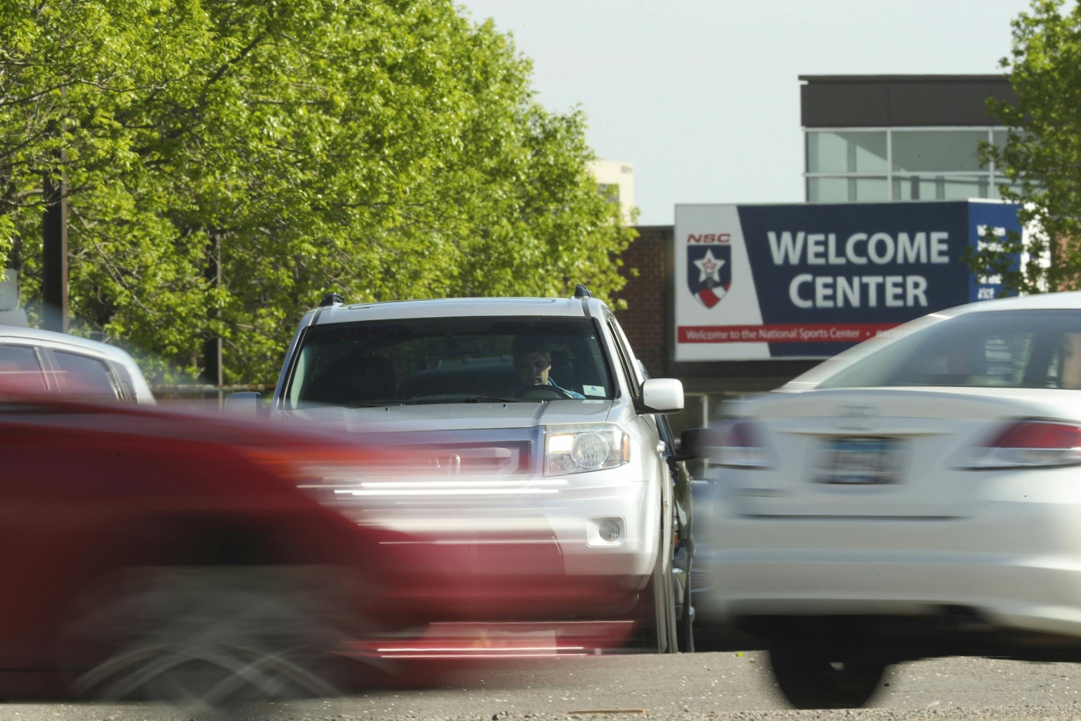 Drivers waited for a break in the traffic to turn onto 105th Ave. NE while leaving the National Sports Center in Blaine Monday evening.
