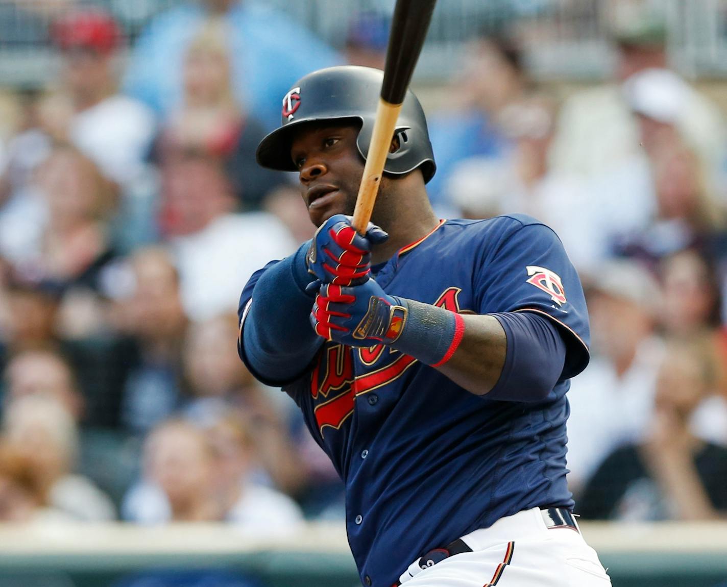 Minnesota Twins' Miguel Sano hits a double off Oakland Athletics pitcher Brett Anderson in the first inning of a baseball game Saturday, July 20, 2019, in Minneapolis. (AP Photo/Jim Mone)