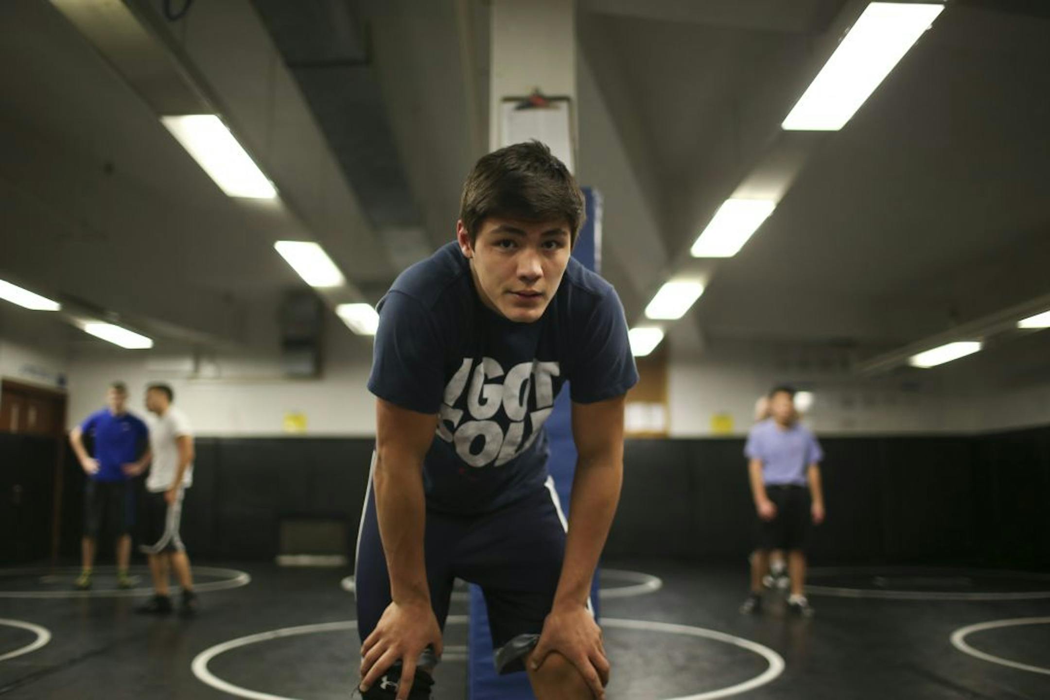 Tartan High School wrestler T.J. O'Hara paused while working out in the wrestling room at the high school in Oakdale during the week before the holidays. Photo by Jeff Wheeler • jwheeler@startribune.com