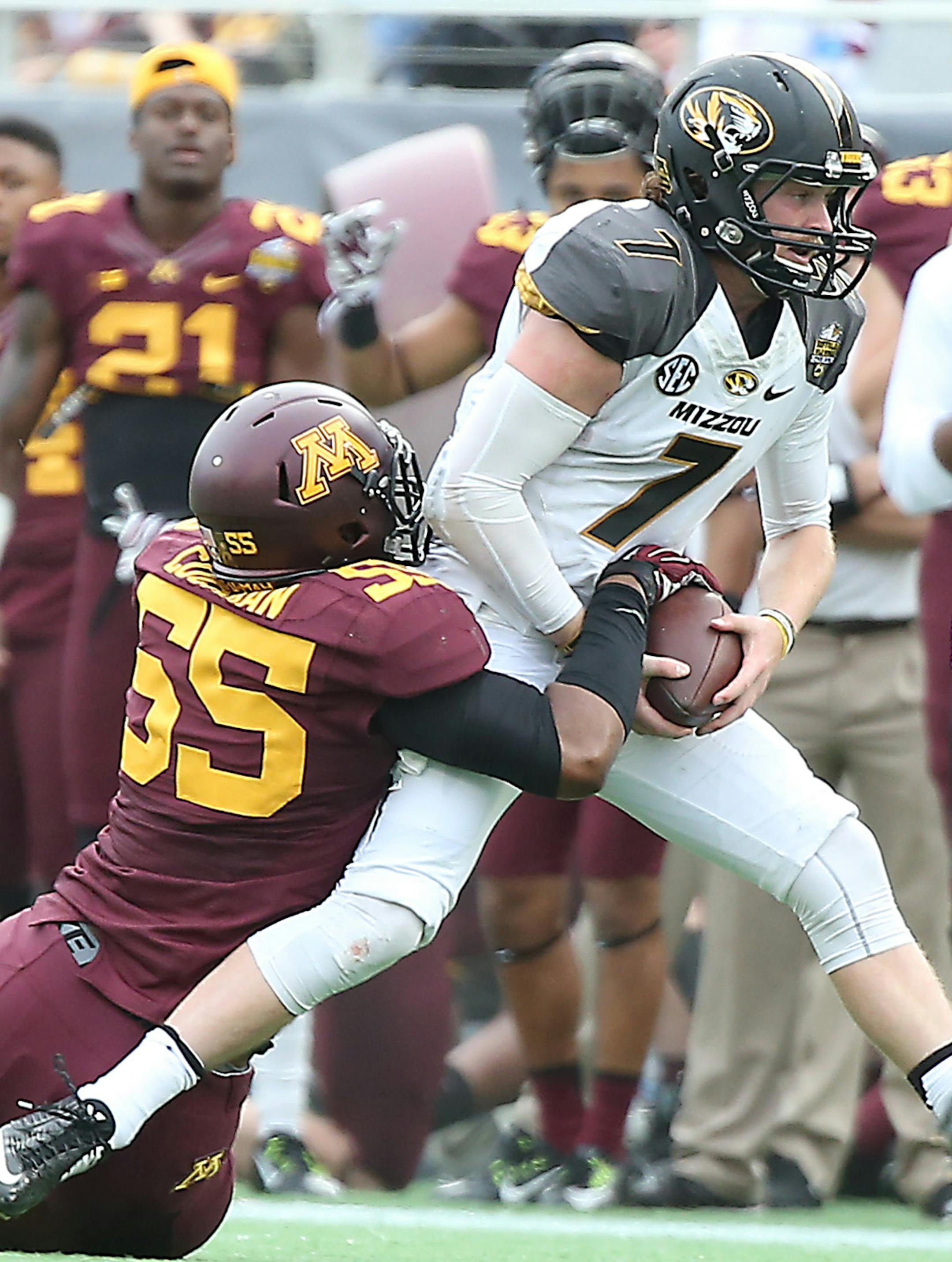 Minnesota's defensive lineman Theiren Cockran (55) sacked Missouri's quarterback Maty Mauk (7) during the third quarter in the Citrus Bowl at Citrus Bowl Stadium, Thursday, January 1, 2015 in Orlando, FL. ] (ELIZABETH FLORES/STAR TRIBUNE) ELIZABETH FLORES • eflores@startribune.com