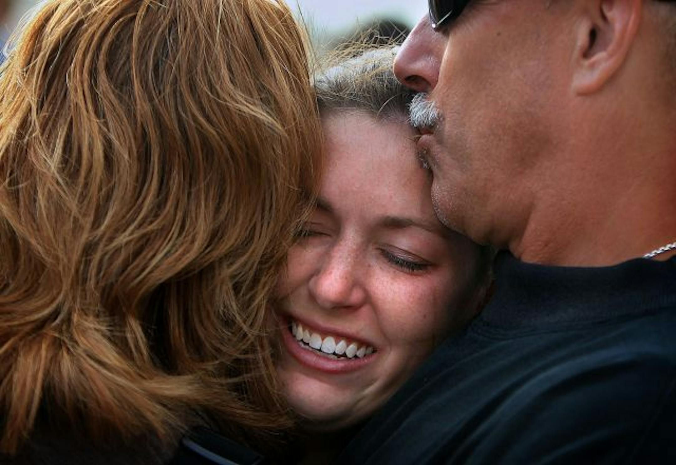 Lori and James Perry of Wabasha said their goodbyes to their daughter, Alicia, on the tarmac just before she left for Afghanistan.