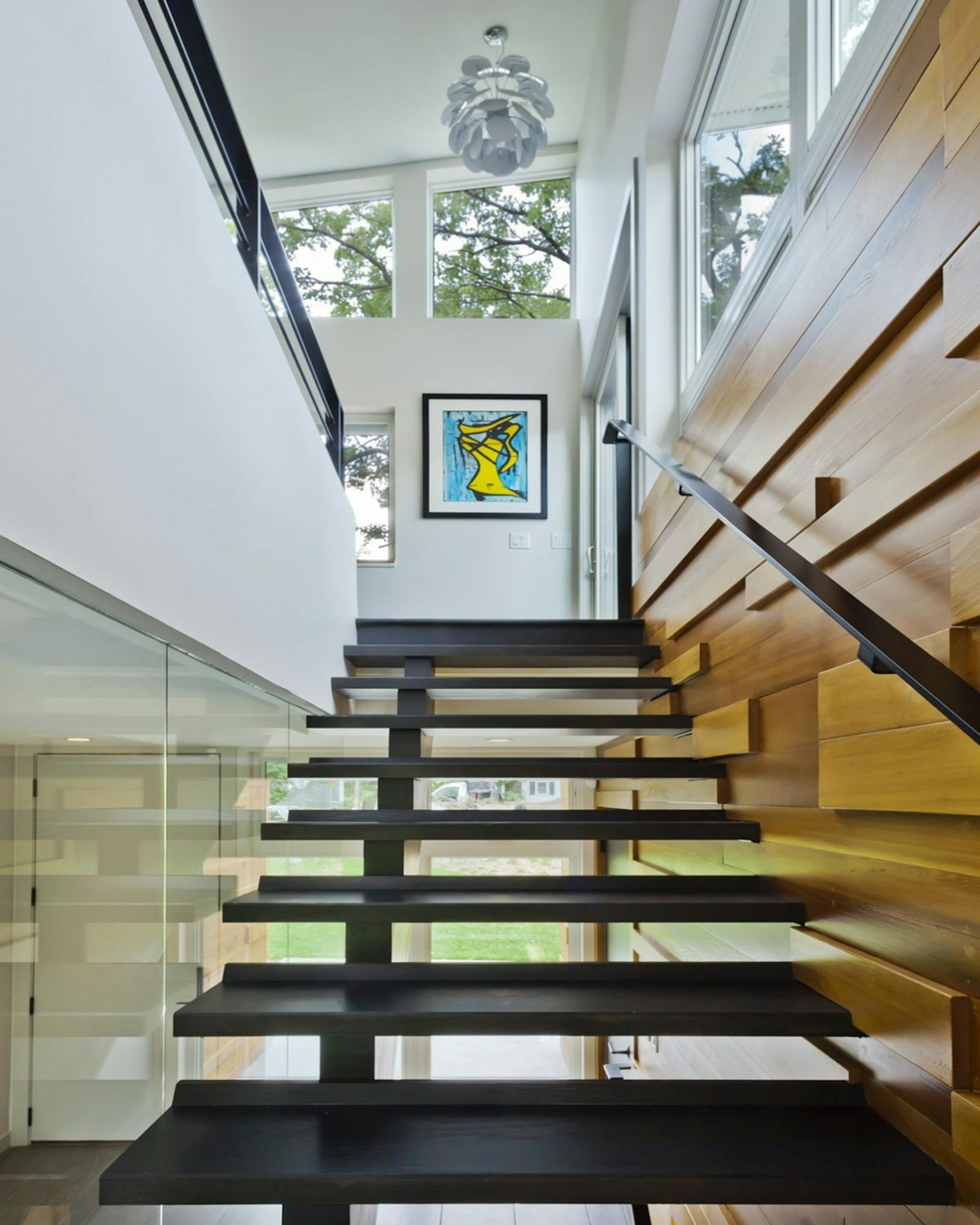 Home of he Month: RoehrSchmitt Architecture translated the best features of a family's downtown loft into a new modern home . Credit Gilbertson Photography