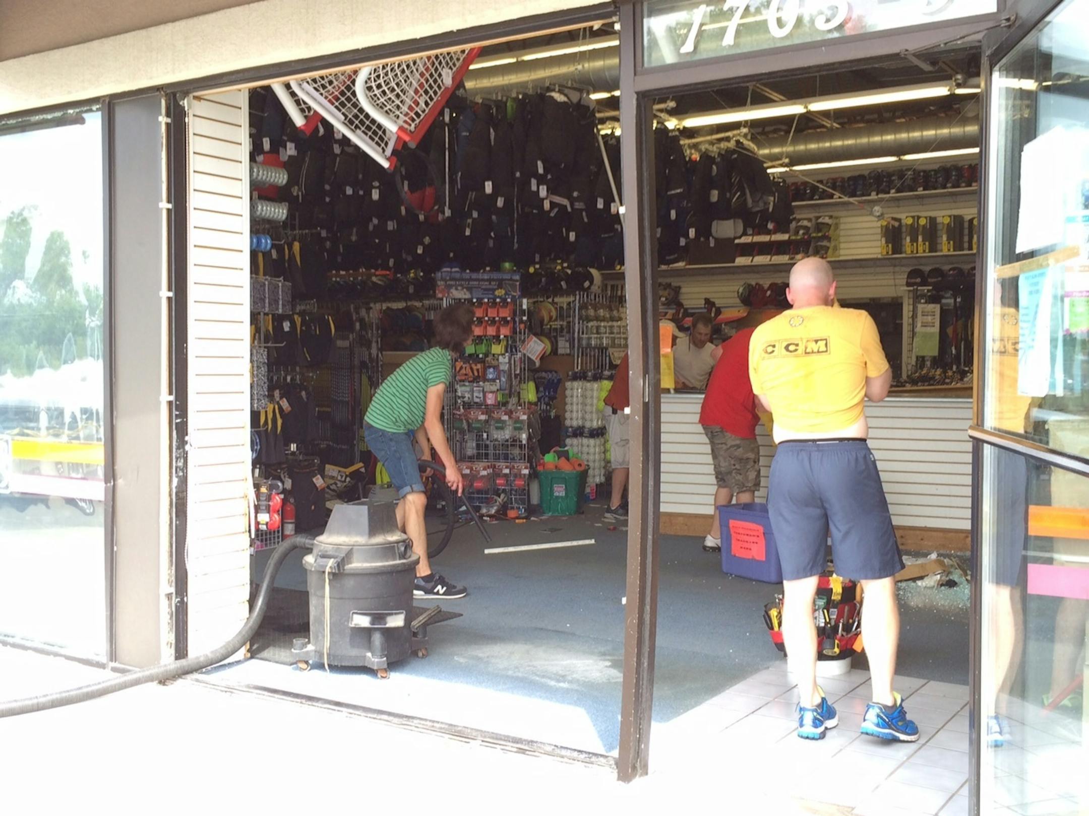 A pickup truck rammed the Play It Again Sports store in Woodbury.