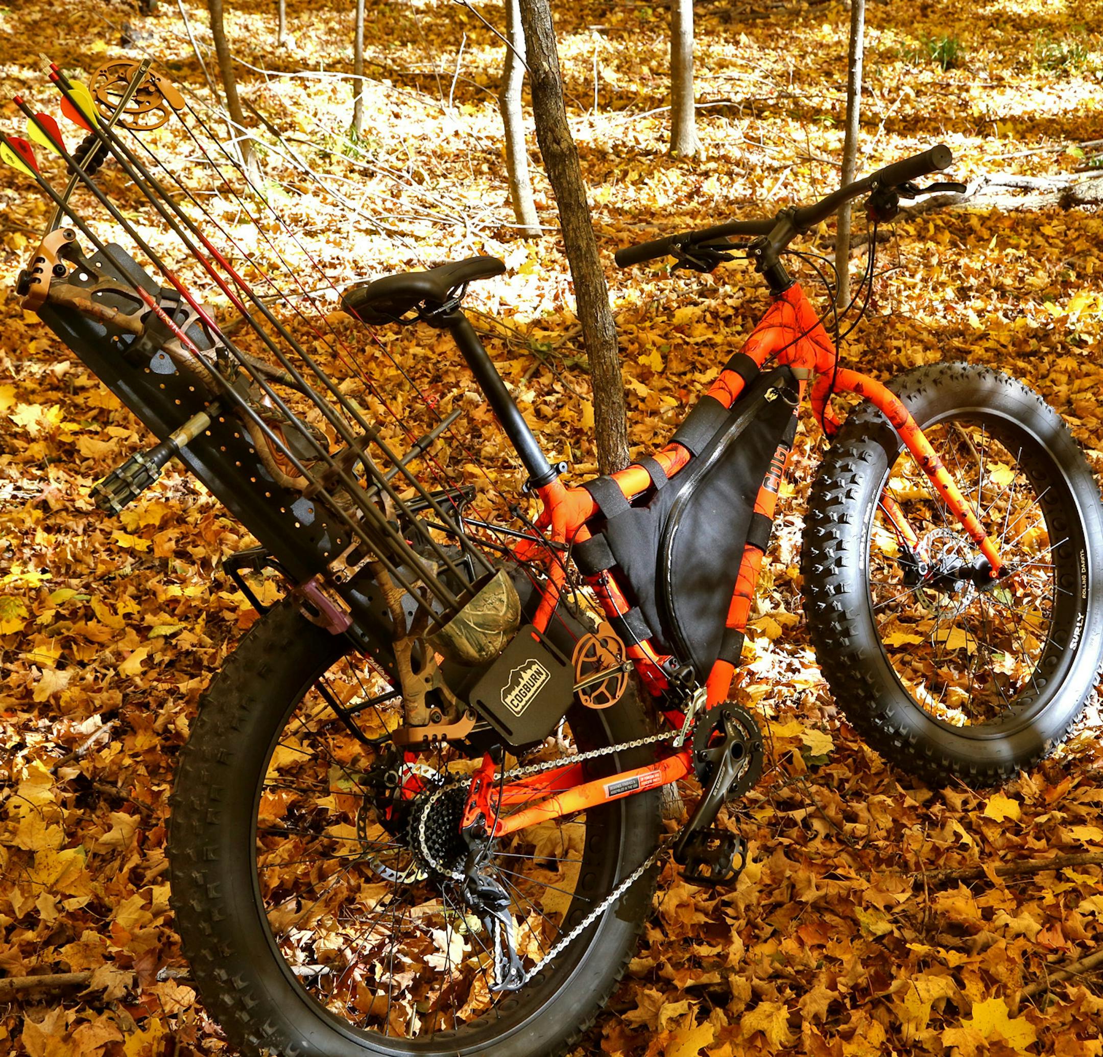 The Cogburn fat-tire hunting bike has a rack that can hold a bow or a gun. Other accessories, including cargo racks front and rear, are available to allow riders to carry camping gear and other equipment needed for multi-day trips.